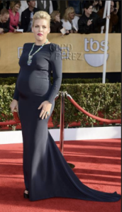 A heavily pregnant Busy phillips on the red carpet, looking stunning